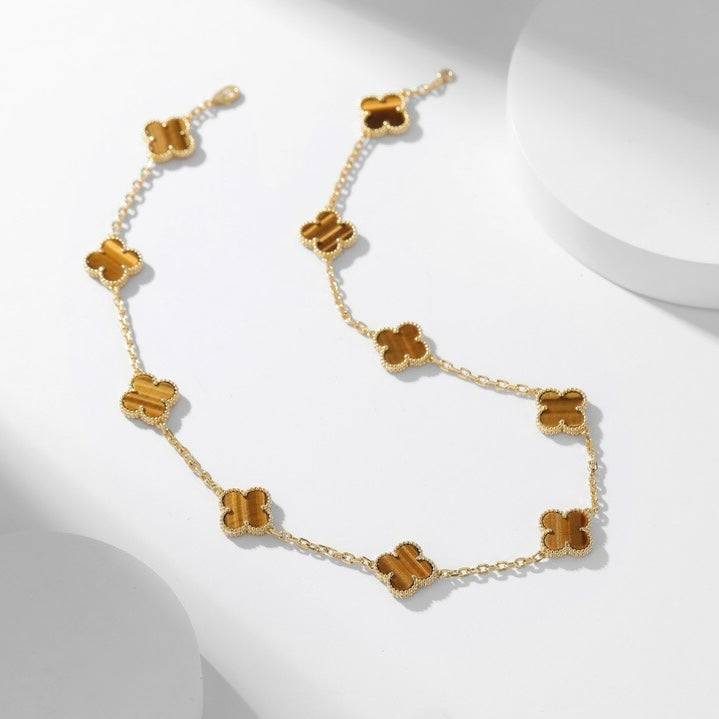 [Joyas Kincade] COLLAR DE OJO DE TIGRE CON 10 MOTIVOS DE TRÉBOLES