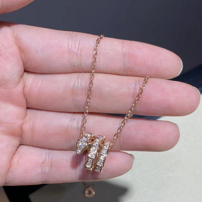 [Kincade Jewelrys]COLLAR SERPENTI DE ORO ROSA CON DOBLE ANILLO Y DIAMANTE